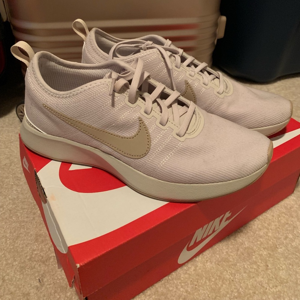 Nike sneakers in the color sand